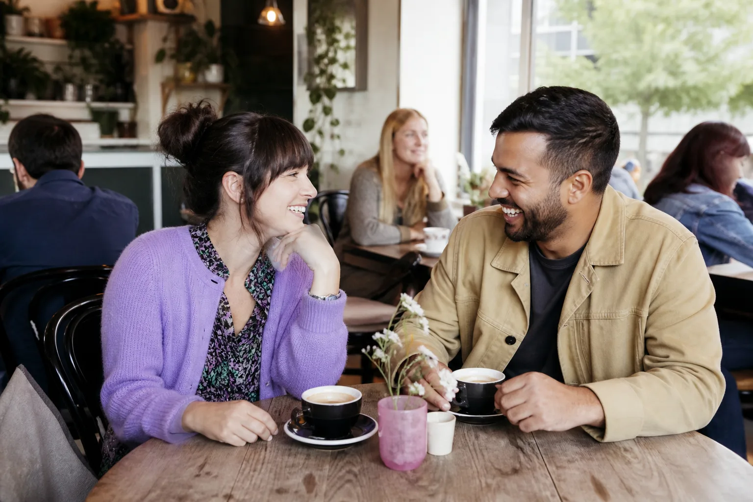 People chatting outside cafés in Carmarthen town centre